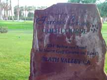 Golf course sign encrusted with desert salts